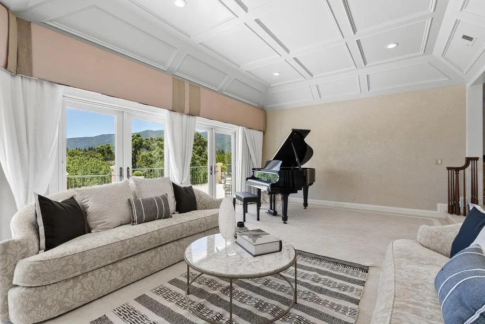 The living room at 112 Madera Court, windows onto the hills